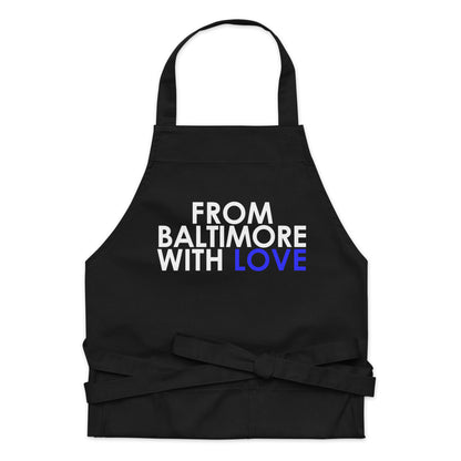 Blue cotton apron from From Baltimore With Love™ featuring a classic design, perfect for cooking or crafting.