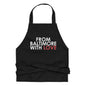 Red cotton apron from Baltimore With Love™ with classic design, featuring adjustable neck straps and front pockets for cooking or baking.