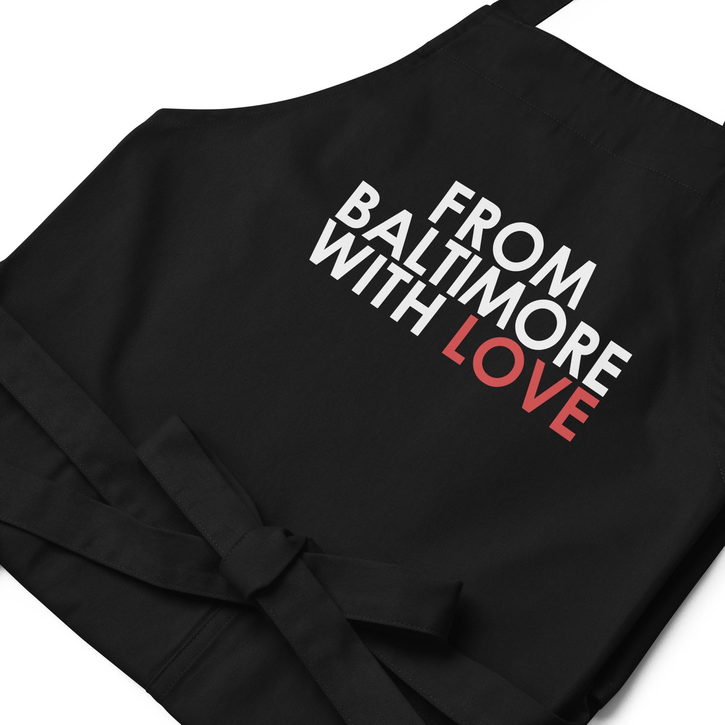 Red cotton apron by From Baltimore With Love™ featuring a classic design, ideal for cooking or crafting activities.
