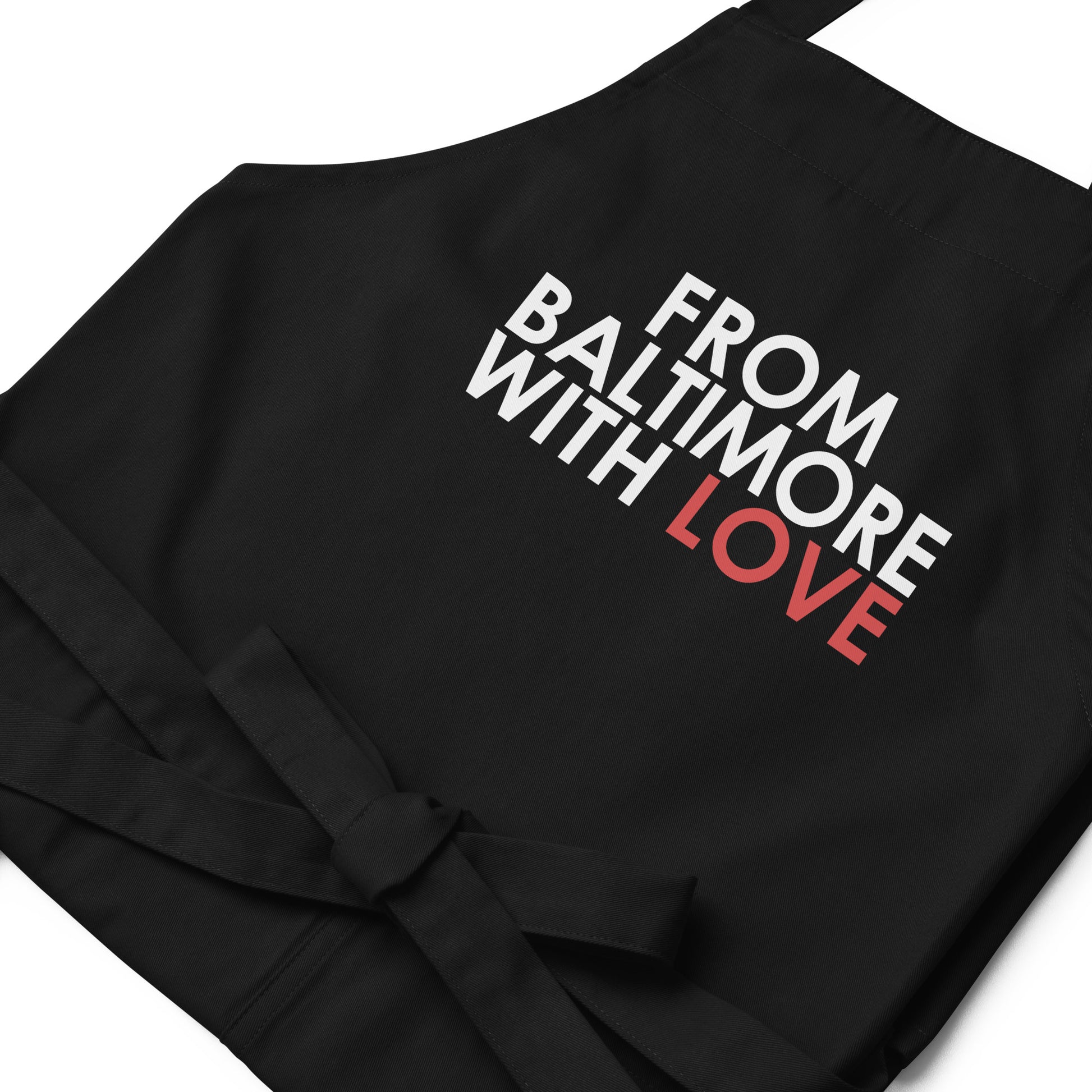 Red cotton apron by From Baltimore With Love™ featuring a classic design, ideal for cooking or crafting activities.