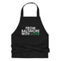 Green cotton apron from Baltimore With Love™ featuring the FBWL logo, shown hanging with adjustable neck strap.