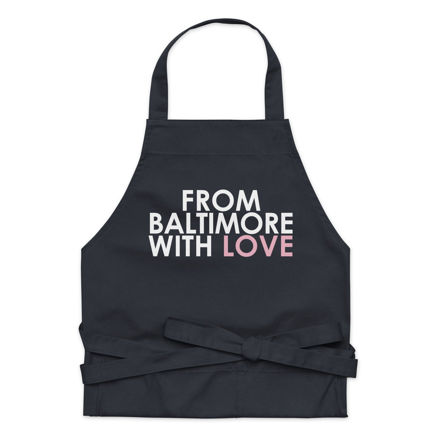 Pink cotton apron by From Baltimore With Love™ featuring a comfortable fit and practical design for cooking or baking.
