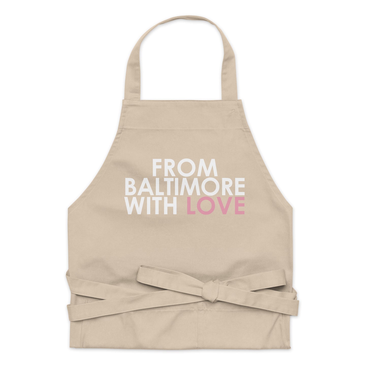 Pink cotton apron by From Baltimore With Love™ with adjustable neck strap and front pocket, perfect for cooking or baking.