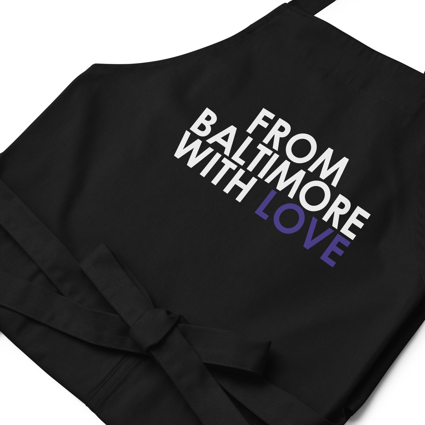 Purple cotton apron from From Baltimore With Love™ featuring a durable design and adjustable straps.