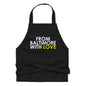 Yellow cotton apron by From Baltimore With Love™ with black straps and pockets, perfect for cooking or gardening.