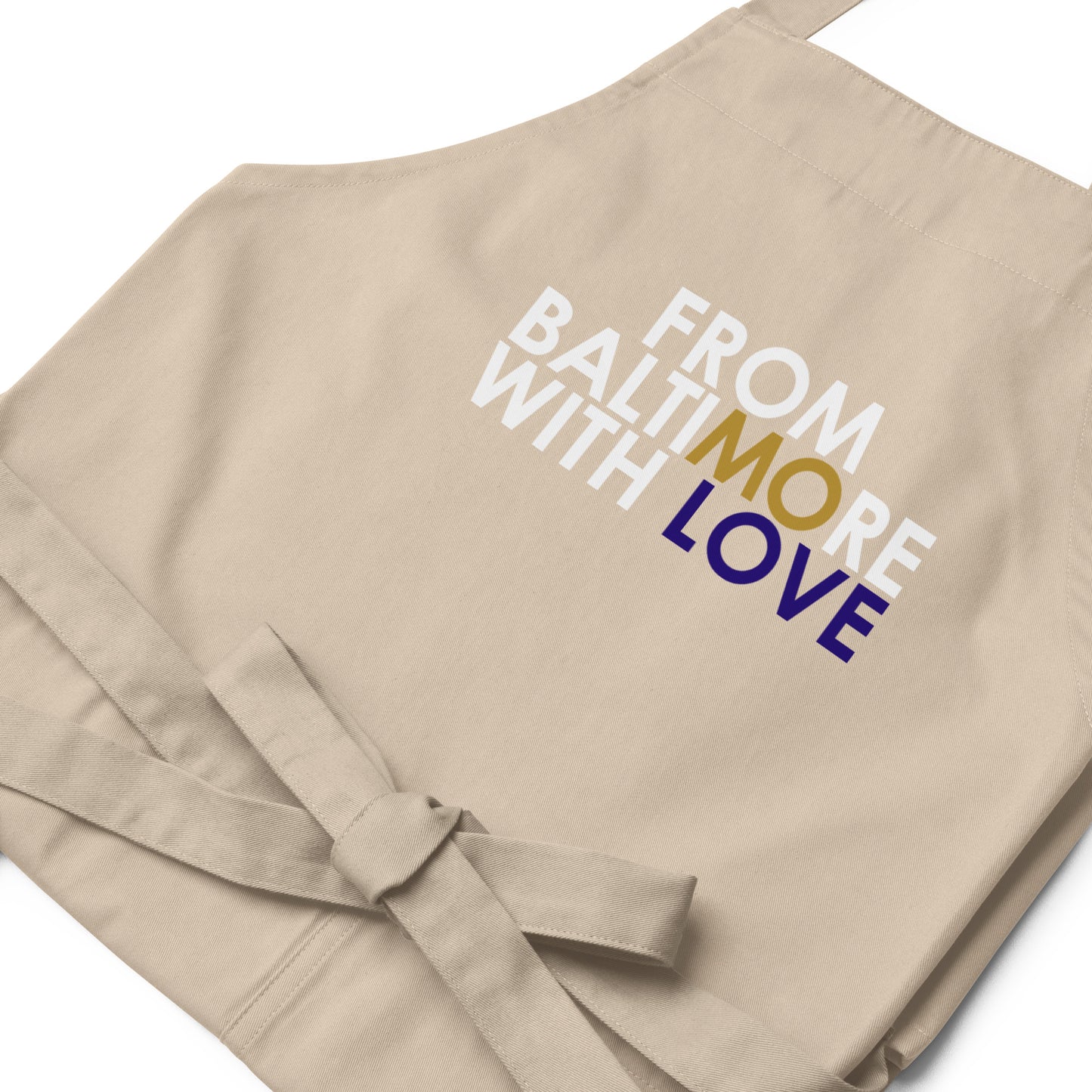 Black FBWL MO Love Organic Cotton Apron by From Baltimore With Love™, featuring a stylish and comfortable kitchen apron.