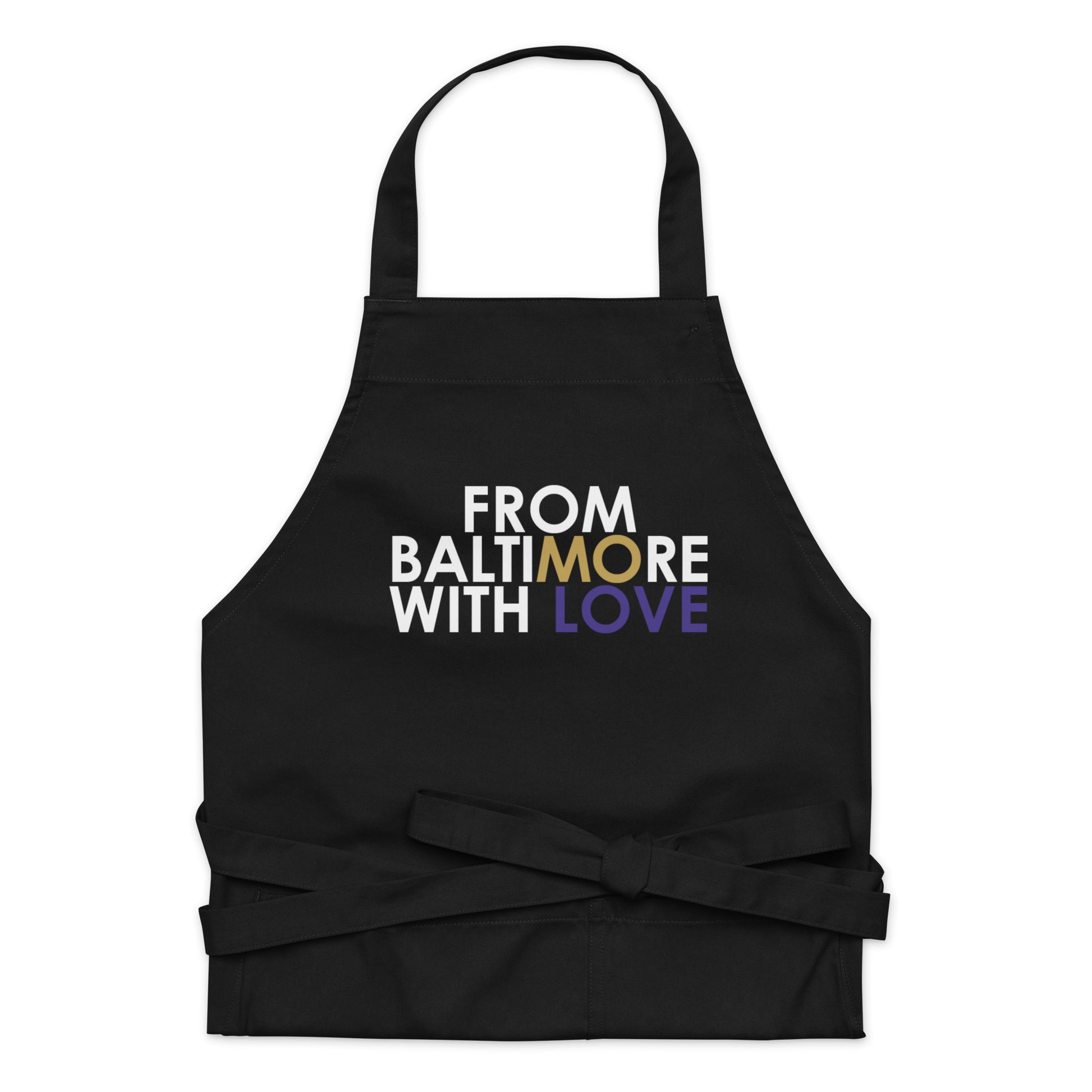 Black organic cotton apron by From Baltimore With Love™ with adjustable neck strap and front pocket, ideal for cooking or crafting.