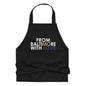 Black organic cotton apron by From Baltimore With Love™ with adjustable neck strap and front pocket, ideal for cooking or crafting.