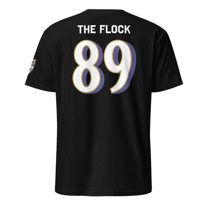Black unisex soft-style T-shirt featuring Ravens Fan Favorite logo on the back, from From Baltimore With Love™.
