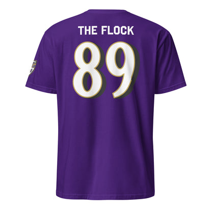 Purple Ravens Fan Favorite unisex soft-style T-shirt featuring Baltimore with Love™ branding, viewed from the back.