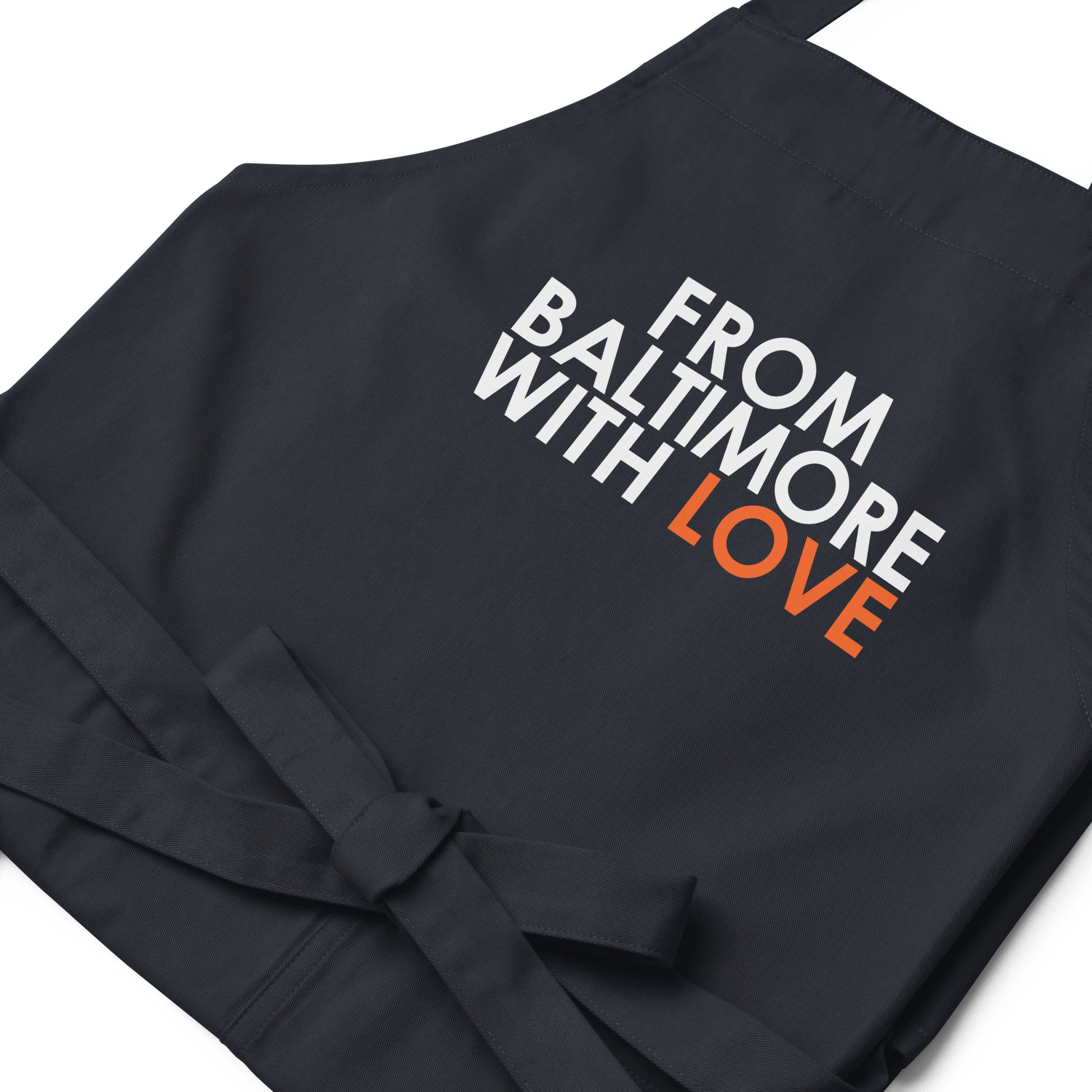 Organic cotton apron from From Baltimore With Love™ featuring a durable rope neck strap and classic design.
