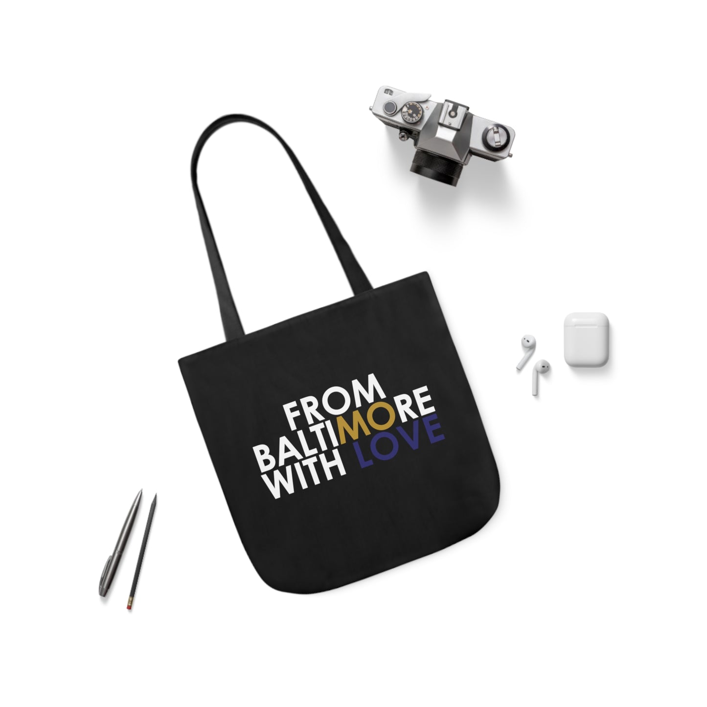 Black tote bag with gold and purple accents, stylish accessories by Printify, showcasing the spacious design and vibrant details.